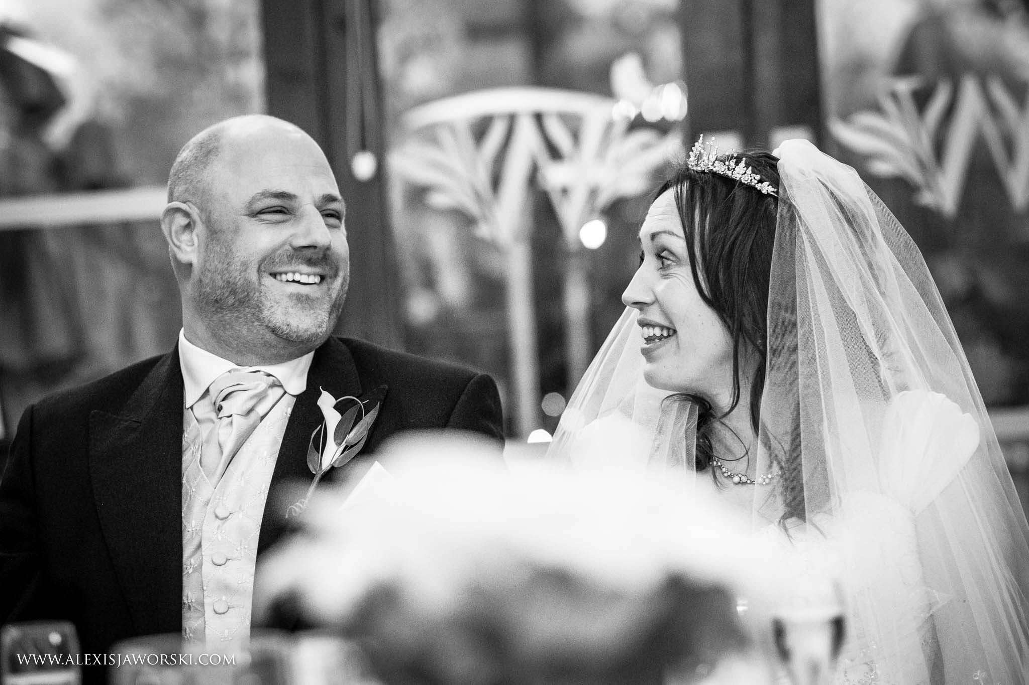 bride and groom laughing