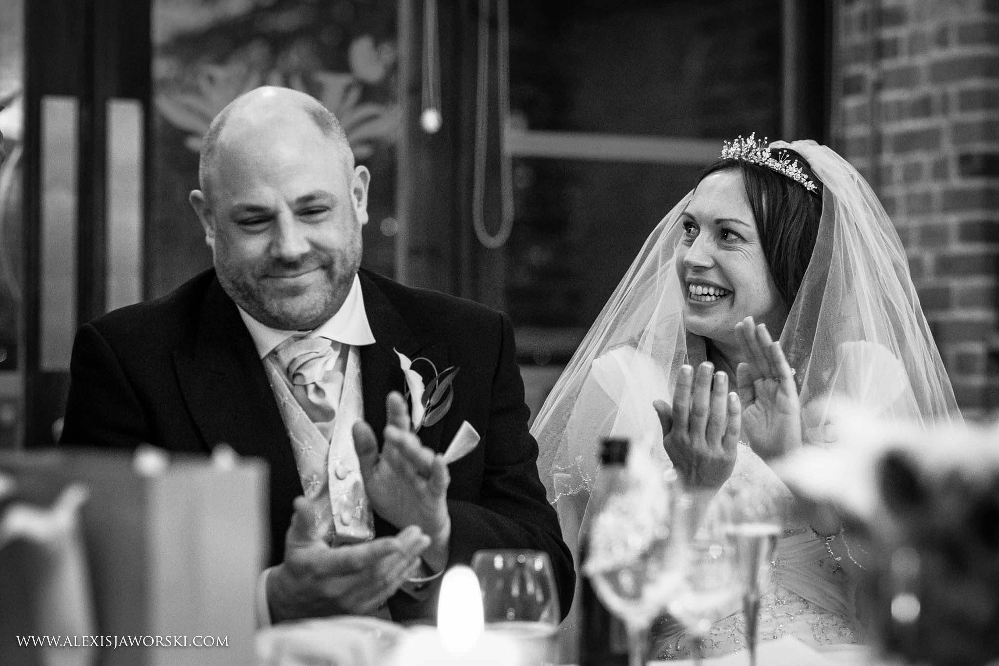 bride and groom clapping