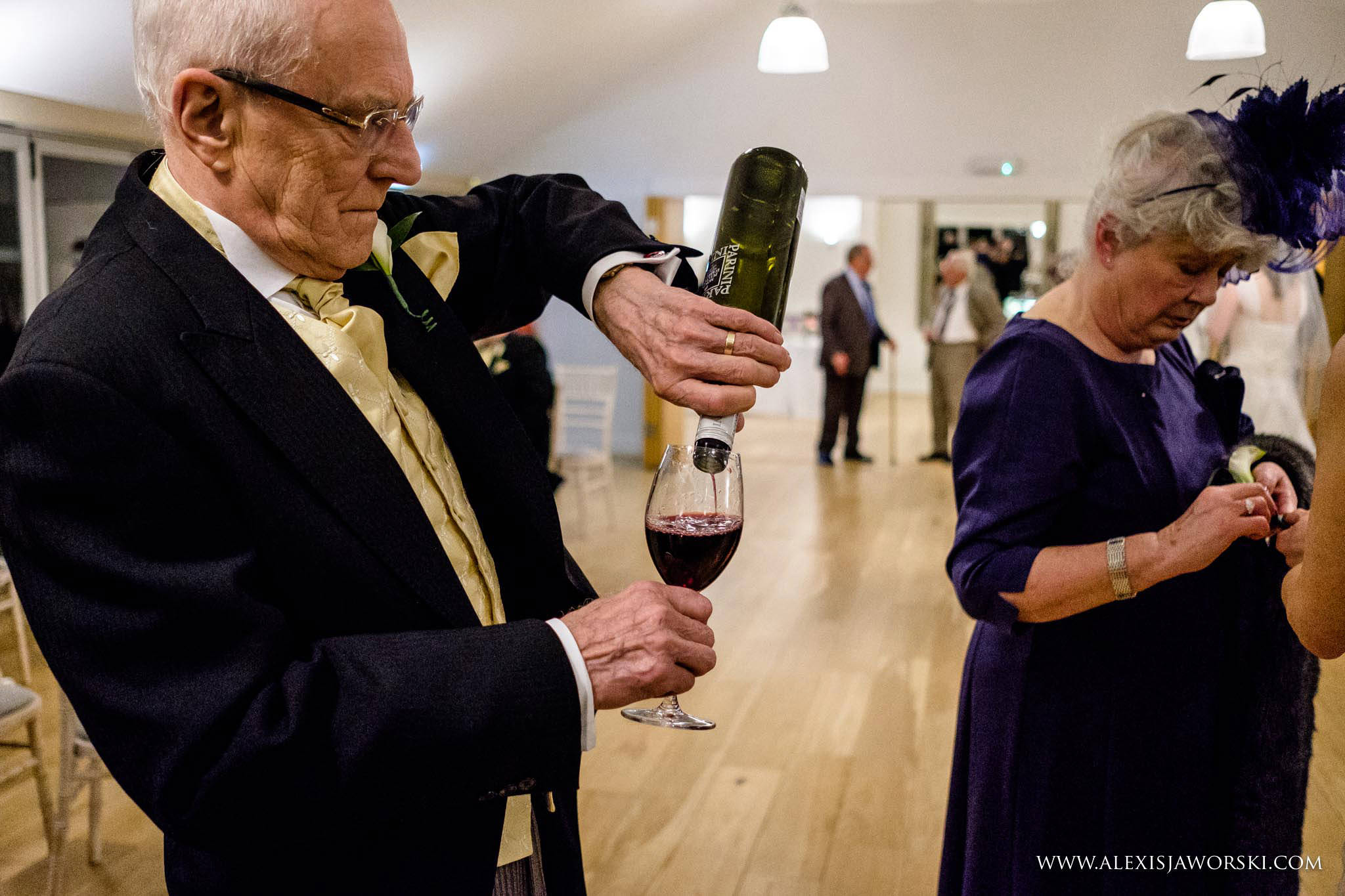 father of the groom drinking