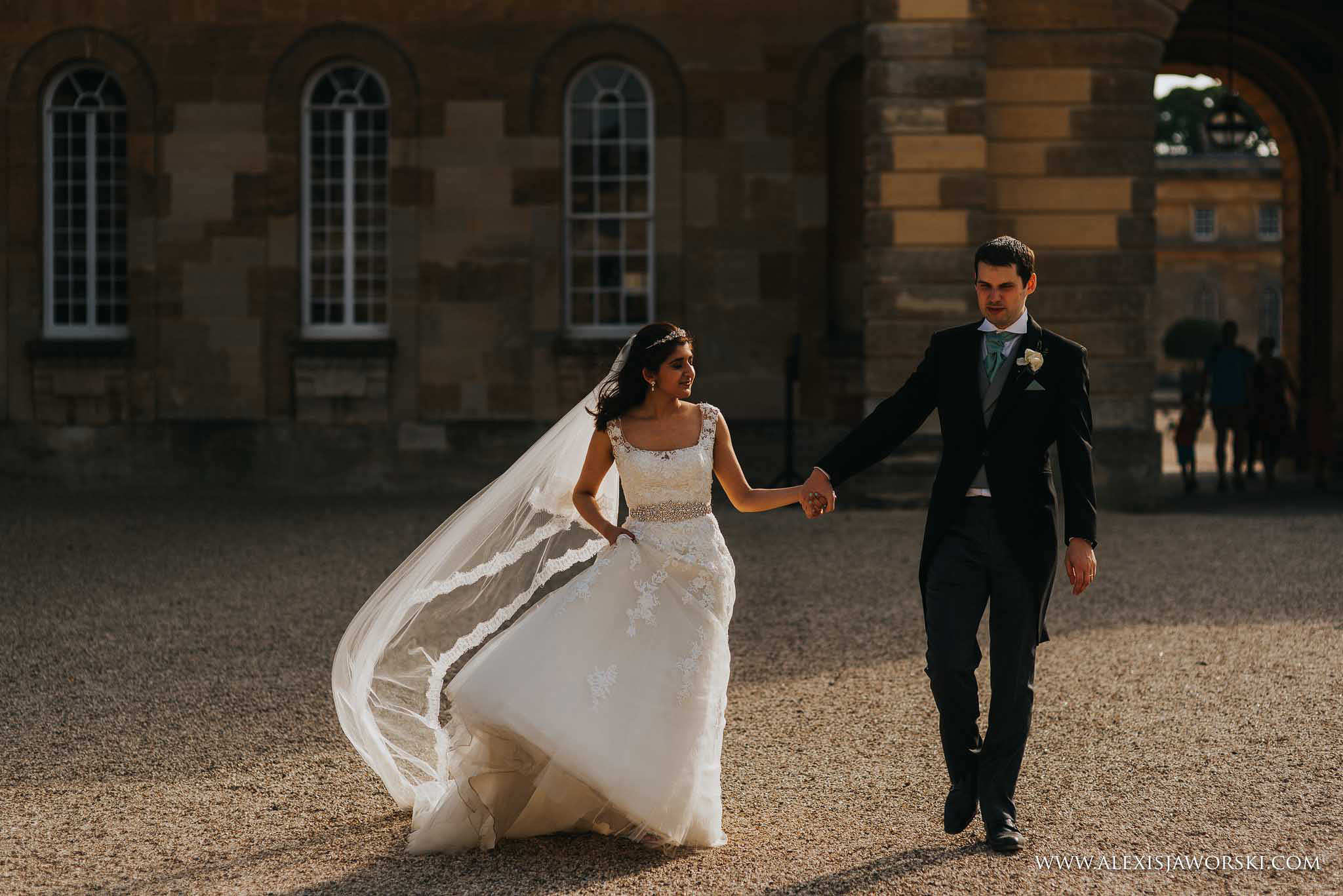 casual walking portrait of bride and groom