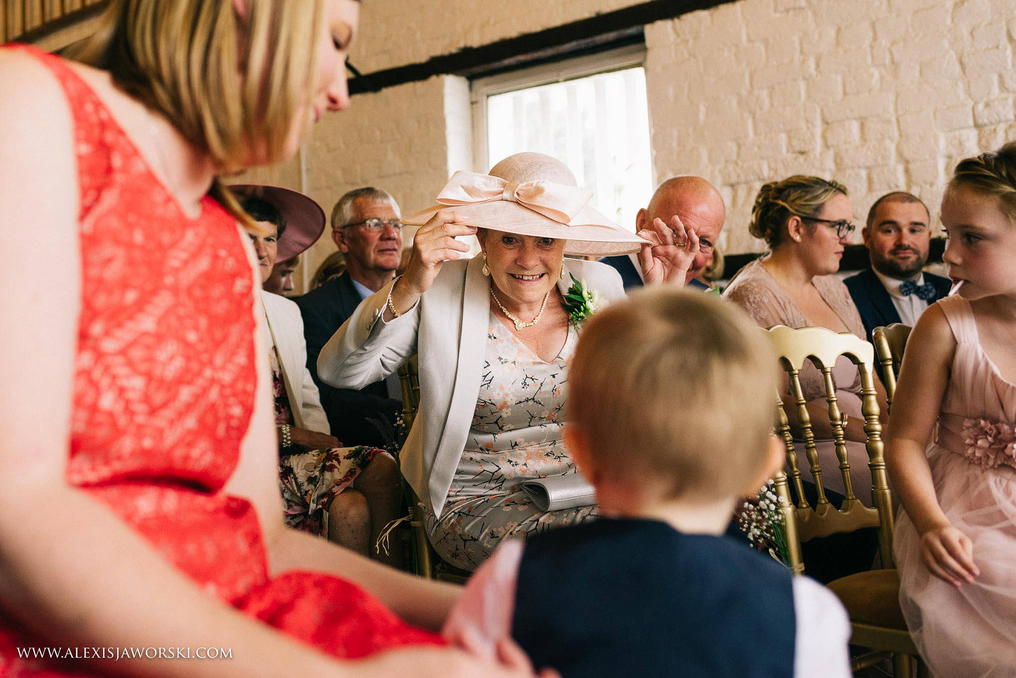 mum of the groom playing with grandchild