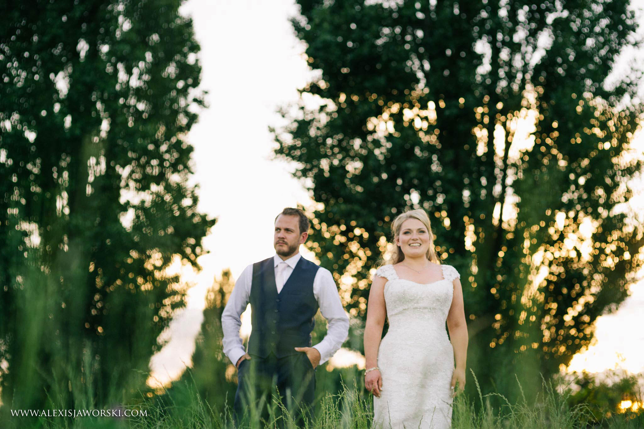 an outdoors portrait of the bride and groom