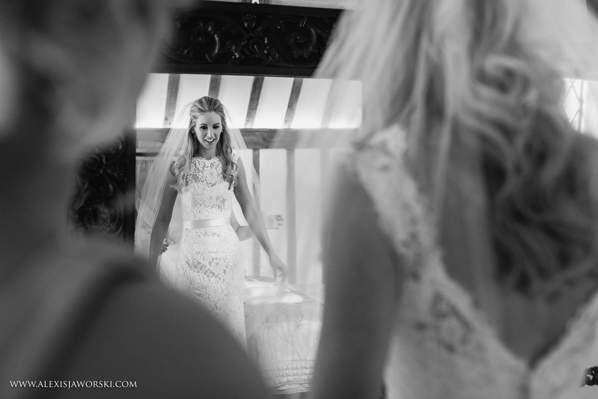 bride looking in mirror