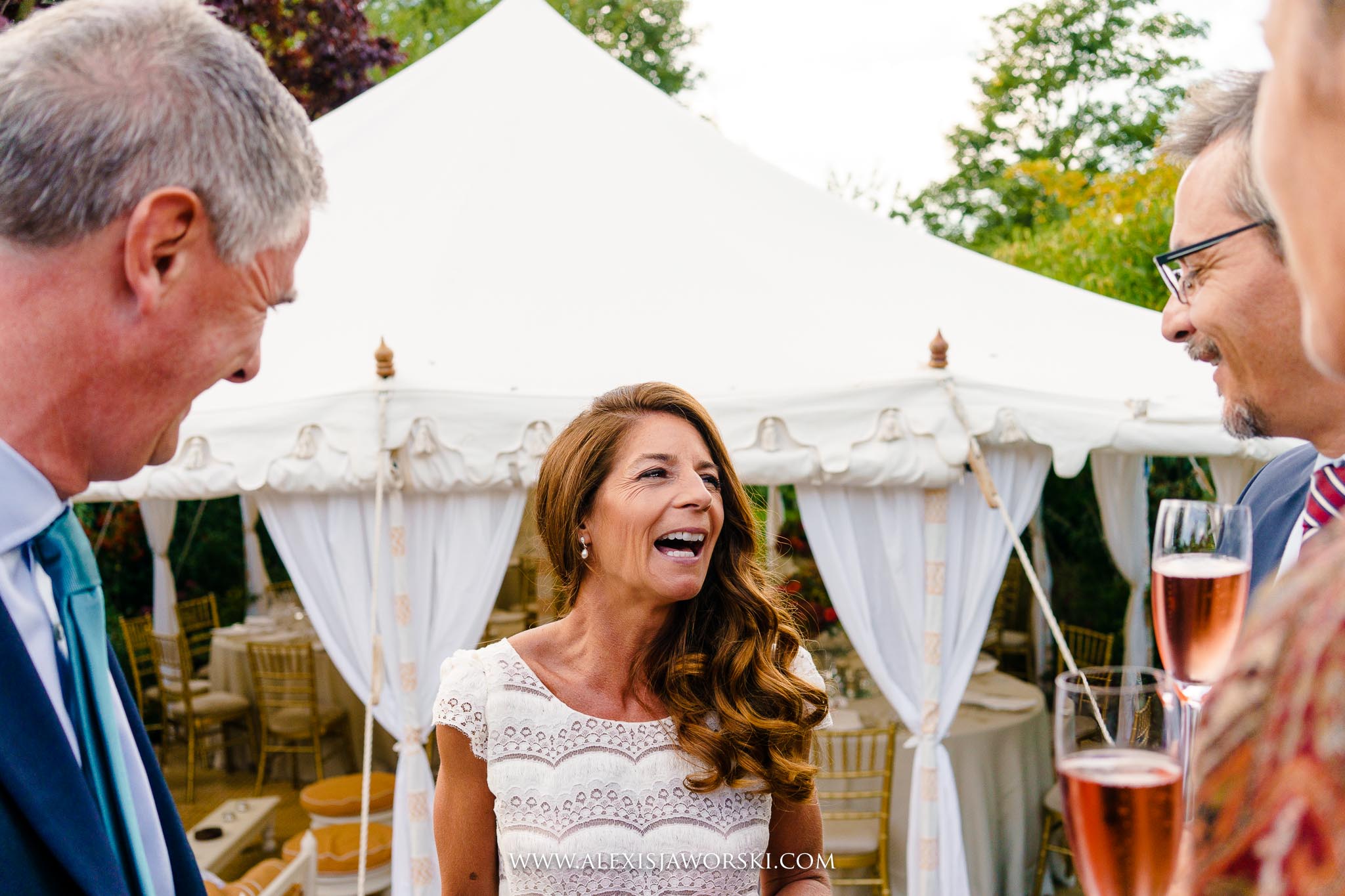 bride laughing with guests