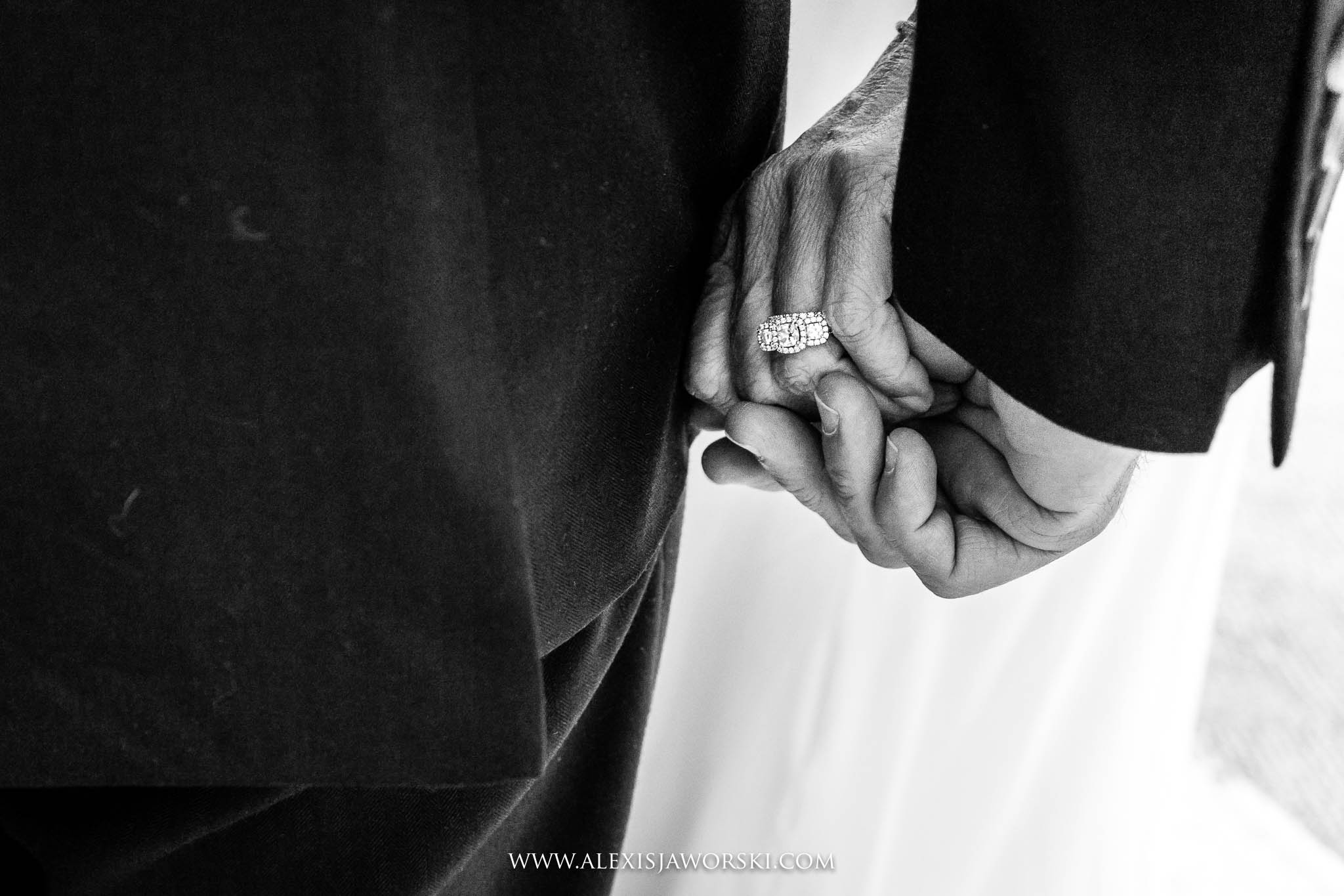 bride and groom holding hands