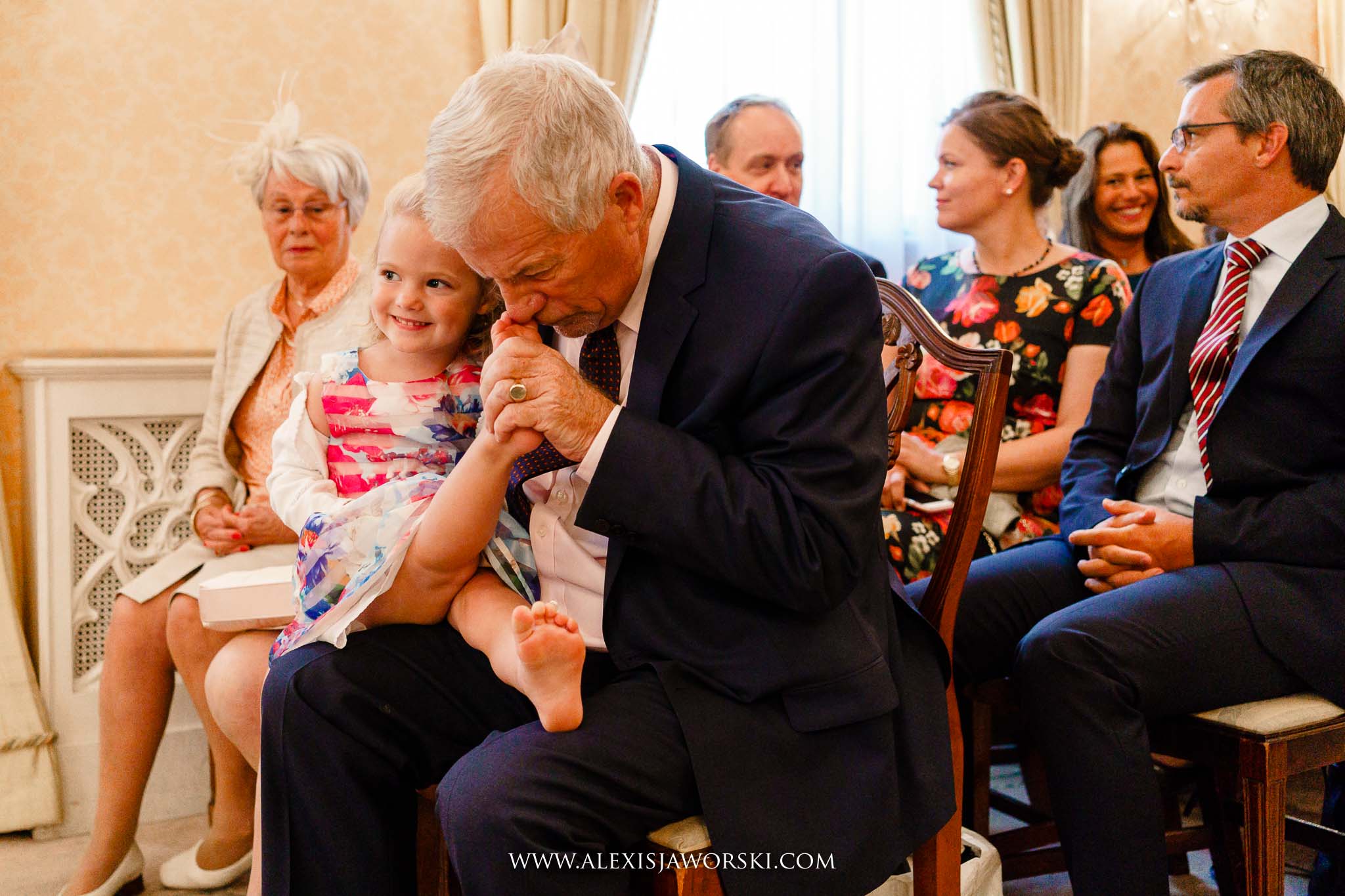 grandad playing with grand daughter